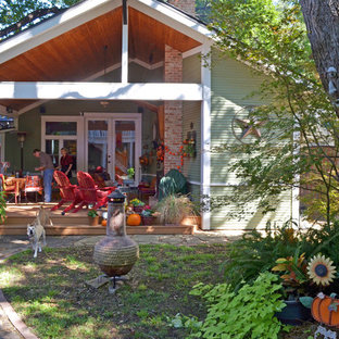 Immagine di un portico american style con un tetto a sbalzo