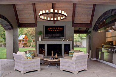 Mid-sized transitional concrete porch idea in Portland with a roof extension