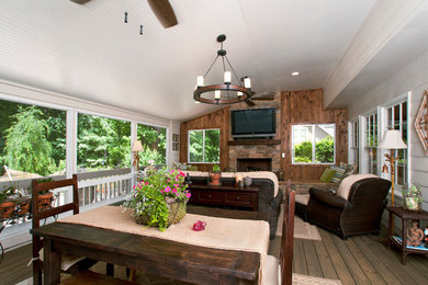 Inspiration for a large timeless back porch remodel in Atlanta with decking and a roof extension