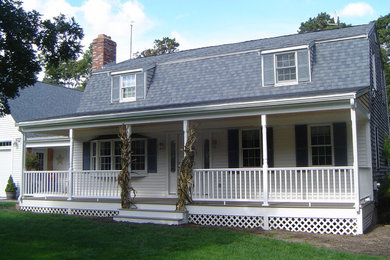 Mid-sized classic front porch idea in Boston with a roof extension