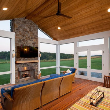Elevated Screened Porch and Patio with Outdoor Fireplace in Sykesville, MD