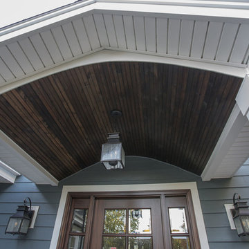 Exterior remodeling in Naperville with siding replacement and porch build out
