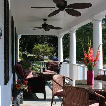 Front Porch With Ceiling Fans and Wicker Furniture