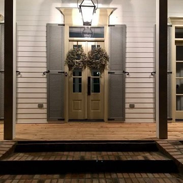 Front Porch - Wood Flooring and Brick Tile Stairs