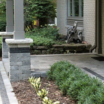 Front Walkway to Porch with Landscape Planting and Backyard Fire Pit