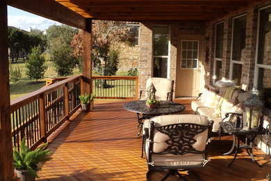 Garapa decking with Oklahoma stone patio and Cedar Pergola