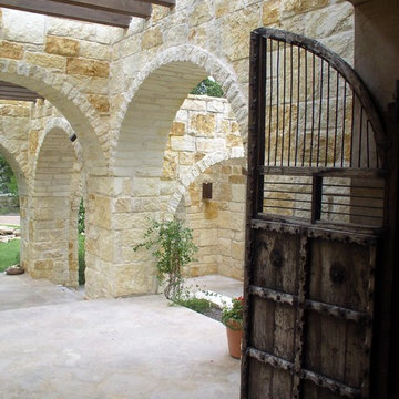 Gates to Stone Arcade to Guest House