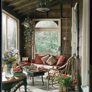 Small mountain style front porch photo in Chicago