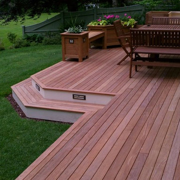 Ipe wood and composite deck with matching planters.