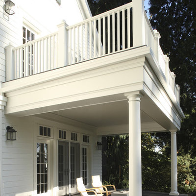 Inspiration for a timeless porch remodel in Portland with a roof extension