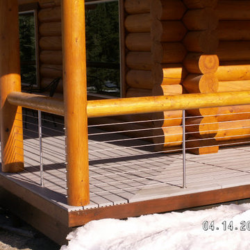 Kenai, AK Peeled Wood Posts and Top Rail with Steel Posts and Cable Infill