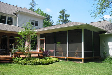 Exemple d'un porche d'entrée de maison chic.