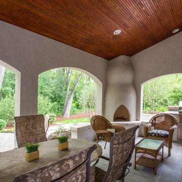 Lanai with "Kiva" Fireplace, Stucco Walls, Bead Board Ceiling and Built In Grill