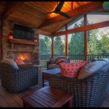 Leawood KS outdoor fireplace on screened porch