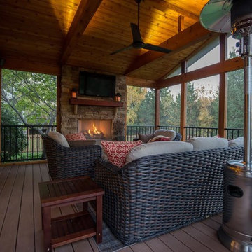 Leawood KS Screened Porch with outdoor fireplace