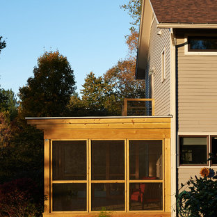 Idee per un portico moderno di medie dimensioni e nel cortile laterale con un portico chiuso e una pergola