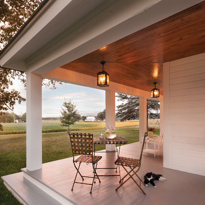 Country porch photo in Other with a roof extension