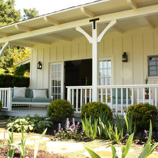 Cottage porch photo in Santa Barbara with decking and a roof extension