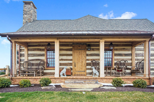 Rustic Porch by Farinelli Construction, Inc.