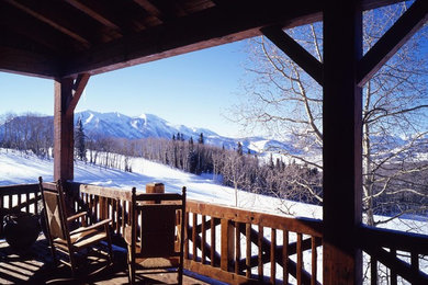 This is an example of a rustic porch design in Denver.