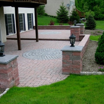 Multi Level Custom Patio with Sitting Walls and Pillars
