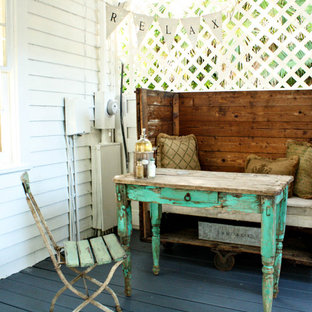 Foto di un portico shabby-chic style con pedane
