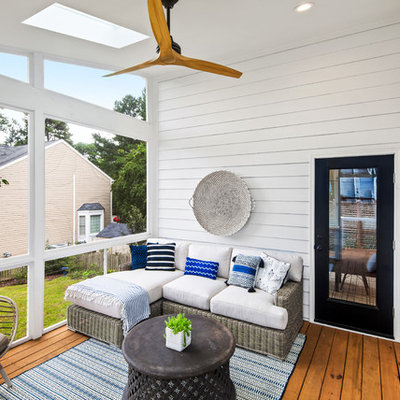 Inspiration for a country porch remodel in Raleigh with decking and a roof extension