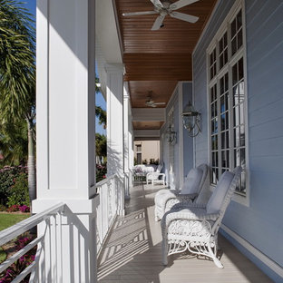 Island style porch photo in Miami