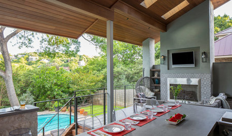 Outdoor grill on screened-in porch