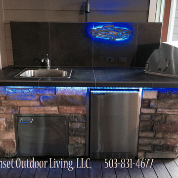 Outdoor Kitchen with LED lighting and custom metal artwork