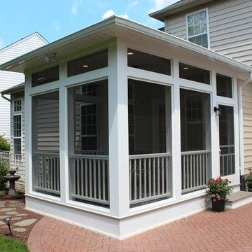 Outdoor living space in New Market, MD screened porch project by Talon Construct