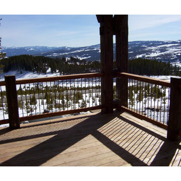 Outdoor Porch with Timber Posts & Wrought Iron Railing Timberview Lodge Yellowst