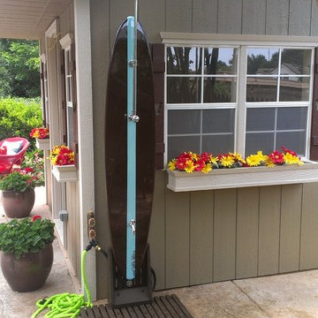 Outdoor surfboard shower. Customer turned our six footer into a shower.