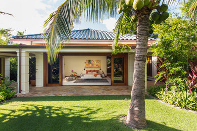 This is an example of a tropical porch design in Hawaii.