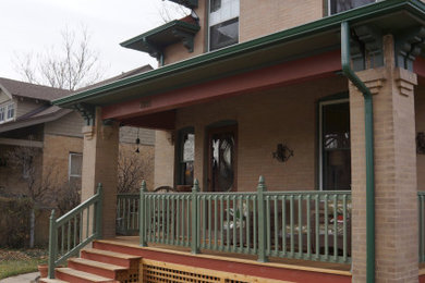 This is an example of a small victorian porch design in Denver with decking and a roof extension.