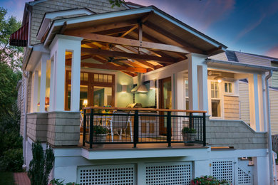 Diseño de terraza contemporánea pequeña en patio trasero y anexo de casas con adoquines de hormigón y cocina exterior