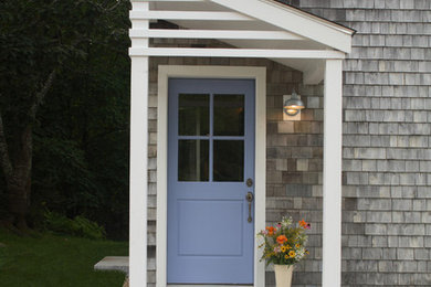 Elegant porch photo in Portland Maine with a roof extension