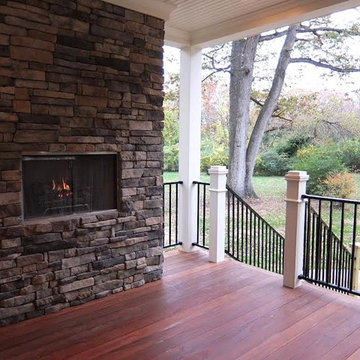 Rear covered porch with stone/gas fireplace