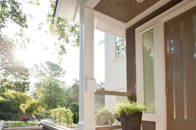 This is an example of a transitional porch design in Vancouver.