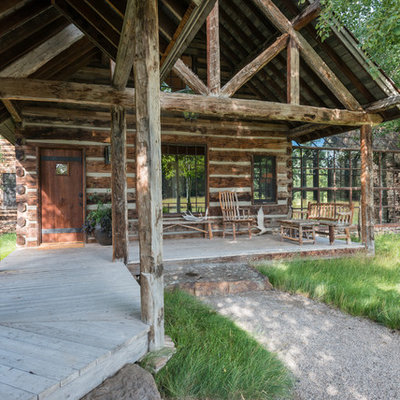 Mountain style front porch idea in Other with decking and a roof extension