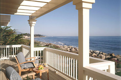 Design ideas for a coastal back veranda in Los Angeles with decking and a roof extension.