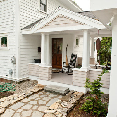 This is an example of a traditional porch design in Portland Maine with a roof extension.