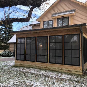 Screen Porch with Bronze Vertical 4-Track Windows in Grayslake, IL