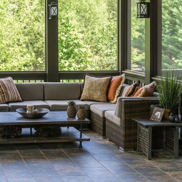Screen porch with tile floor.