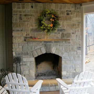 Screen porch with wood burning fireplace