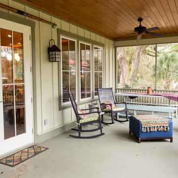 screened in porch with wood ceiling