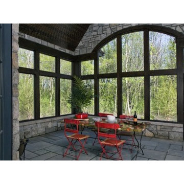 Screened Porch Featuring Tumbled Stone Interior and Knee Walls