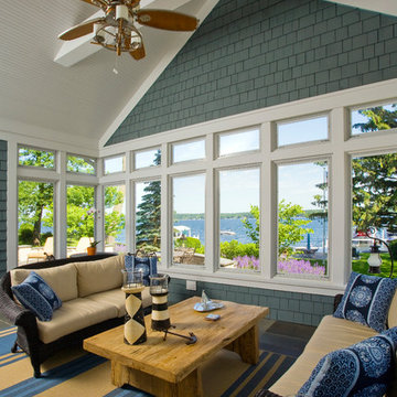 Screened Porch with Painted White Collar Tie and Nautical Themed Ceiling Fan