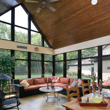 Screened Porch with Vaulted Stained Beadboard Ceiling and Concrete Floors