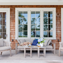 Beach Style Porch by Wettling Architects
